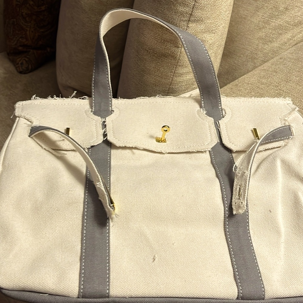 Boatkin with grey/blue straps and gold hardware